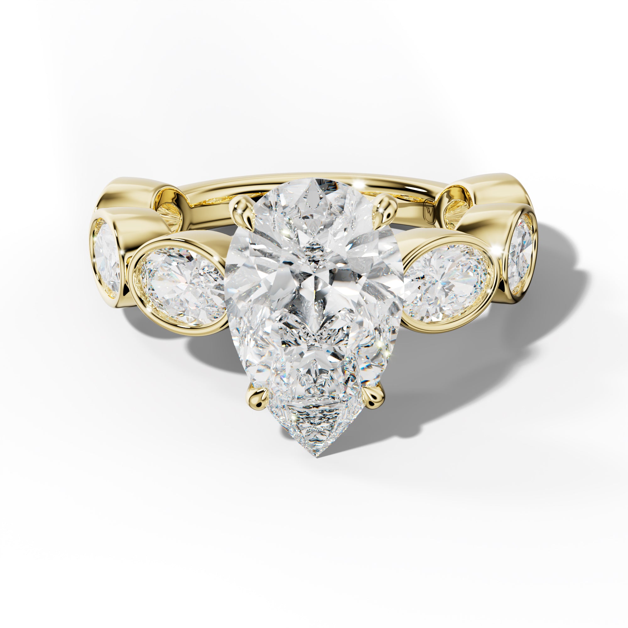 Leilani Pear Shape Engagement Ring With East West Oval Side Stones