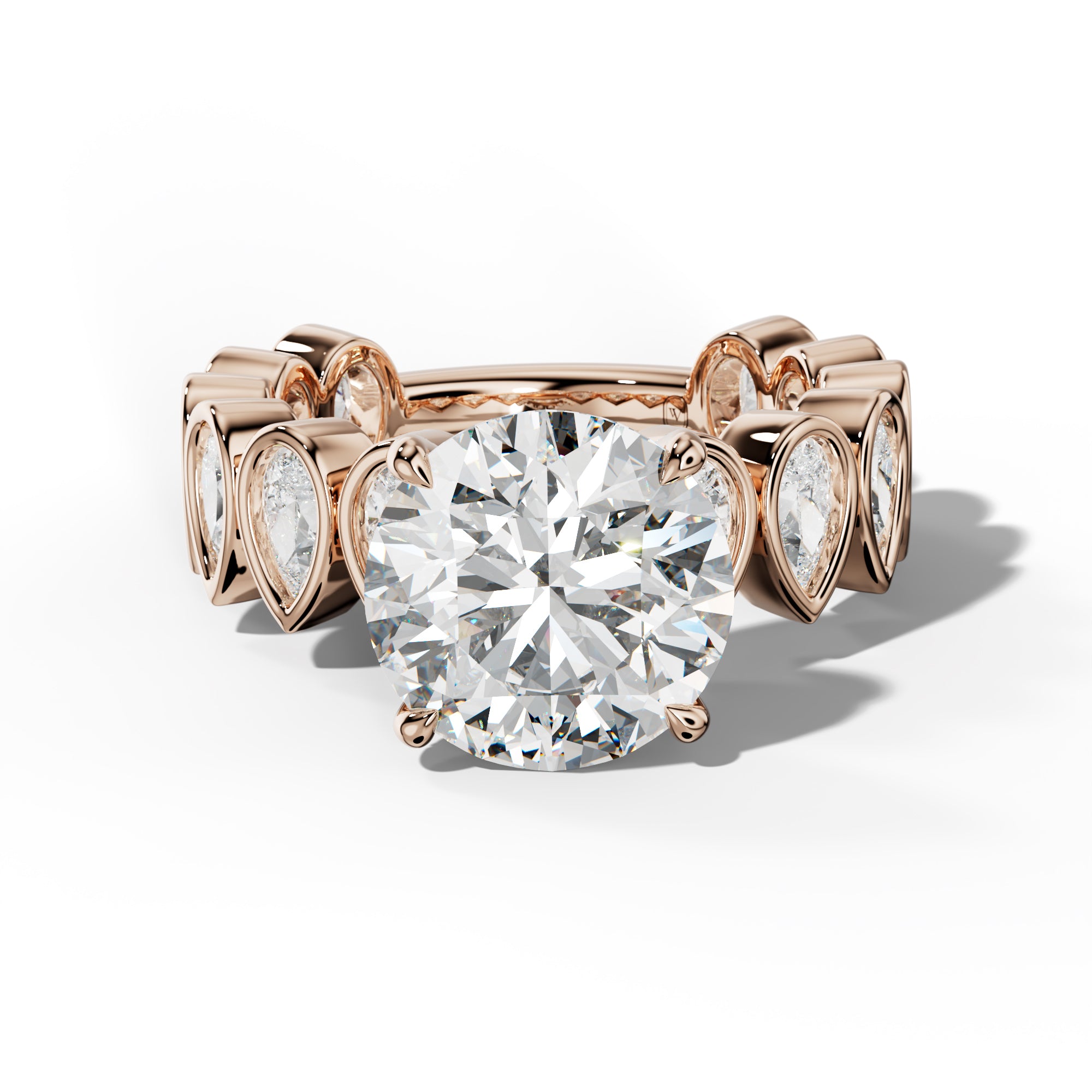 Beatrice Round Diamond Engagement Ring With Pear Side Stones