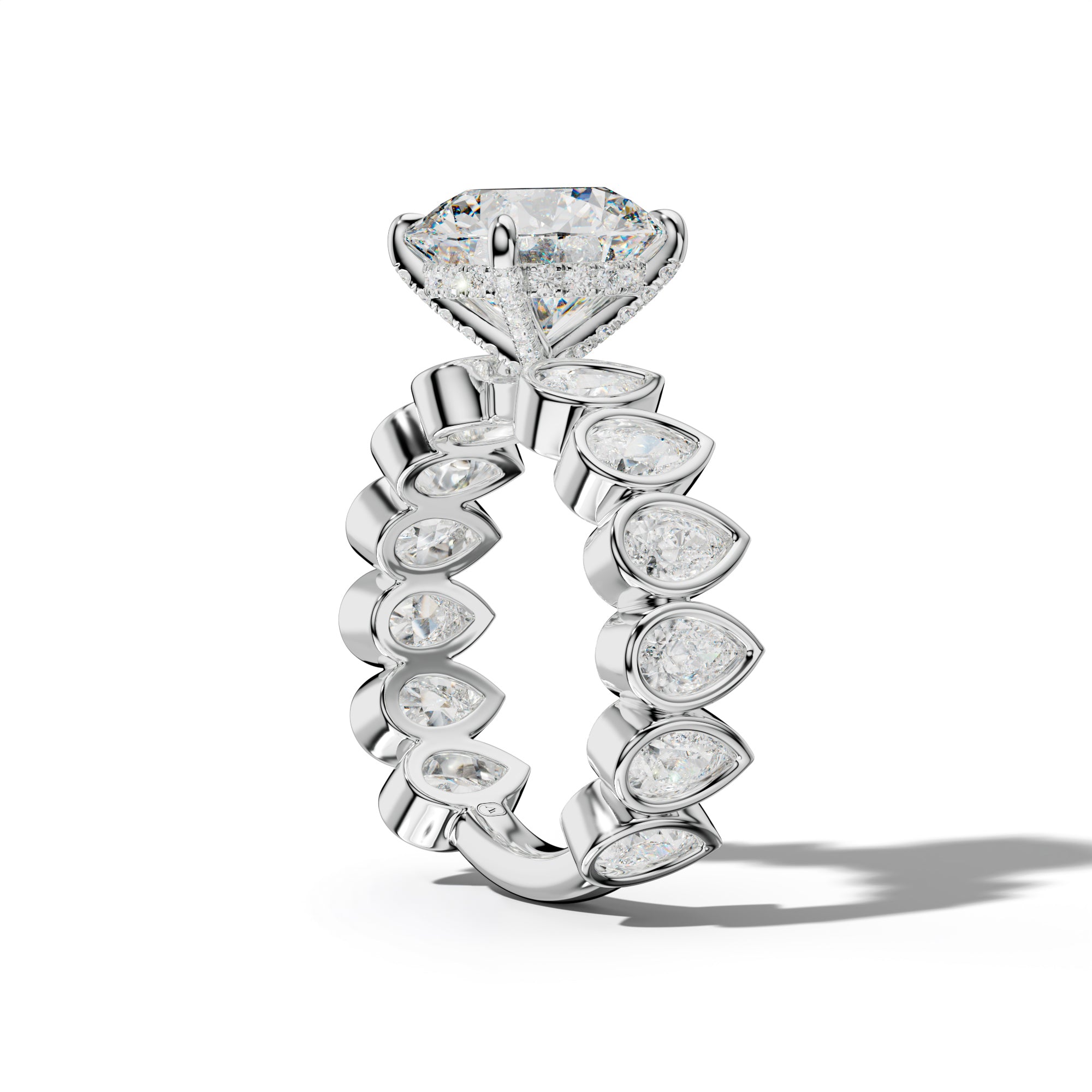 Beatrice Round Diamond Engagement Ring With Pear Side Stones