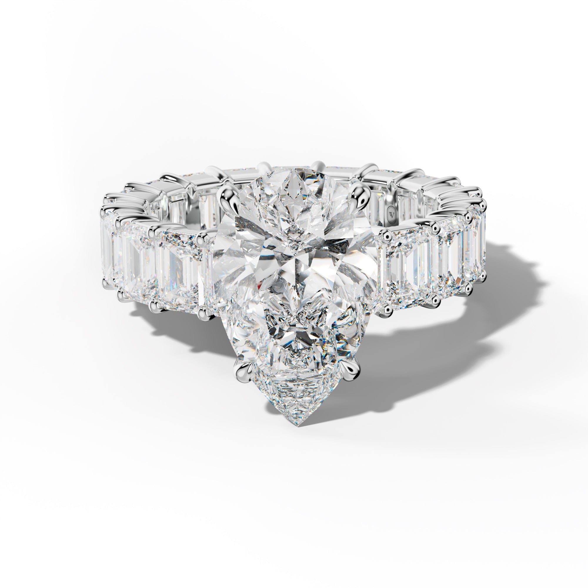 Willow Pear Shape Engagement Ring With Emerald Cut Side Stones