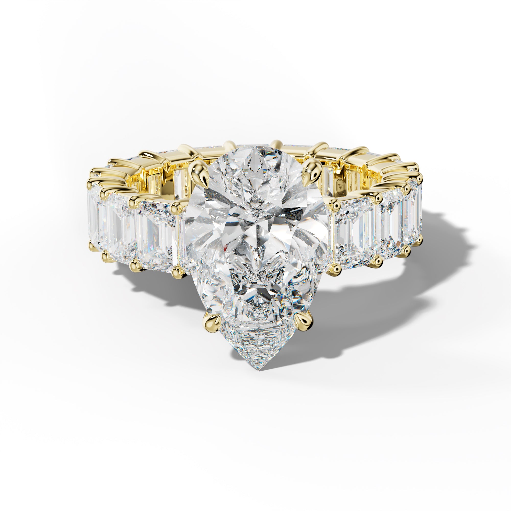 Willow Pear Shape Engagement Ring With Emerald Cut Side Stones
