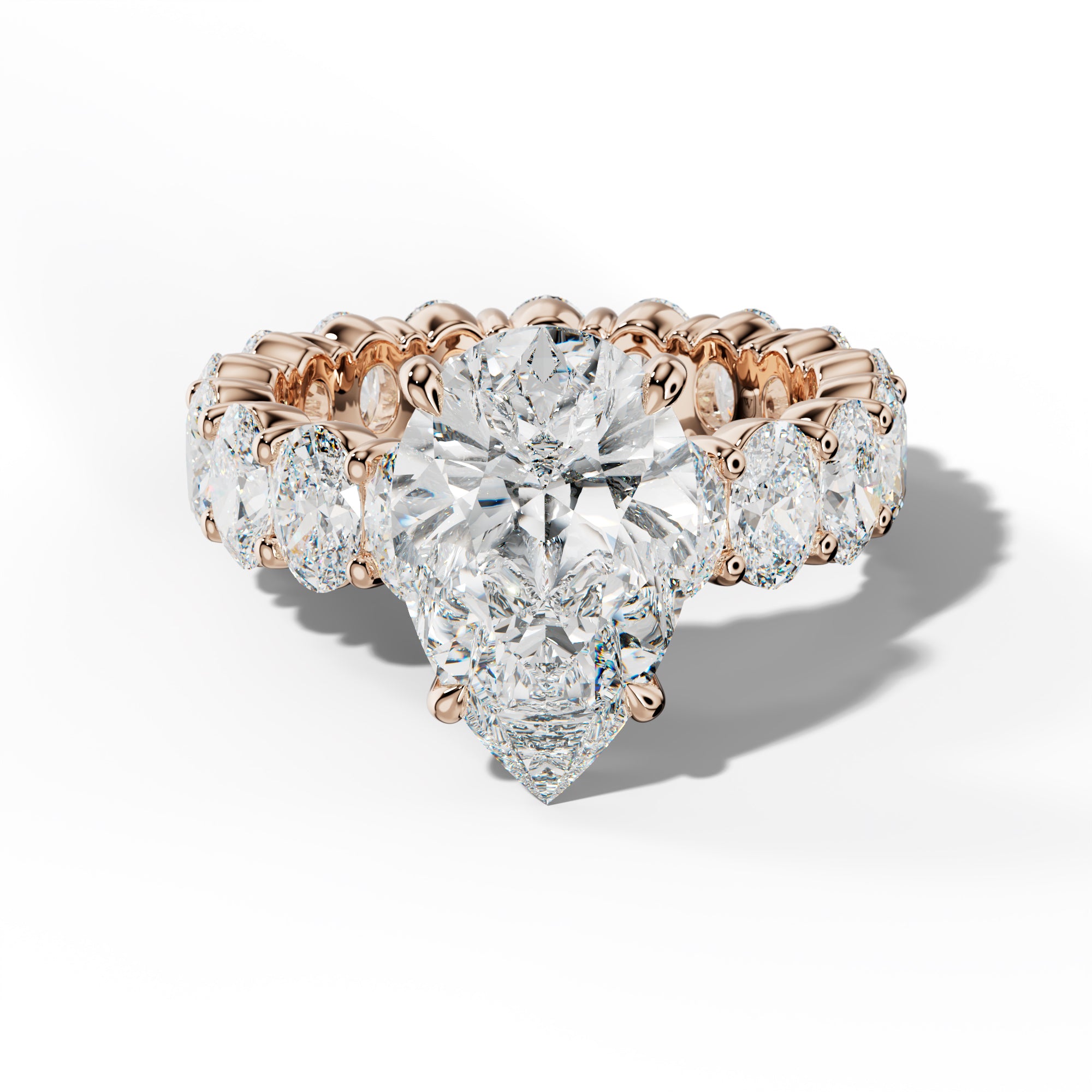 Belen Pear Shape Engagement Ring With Oval Side Stones