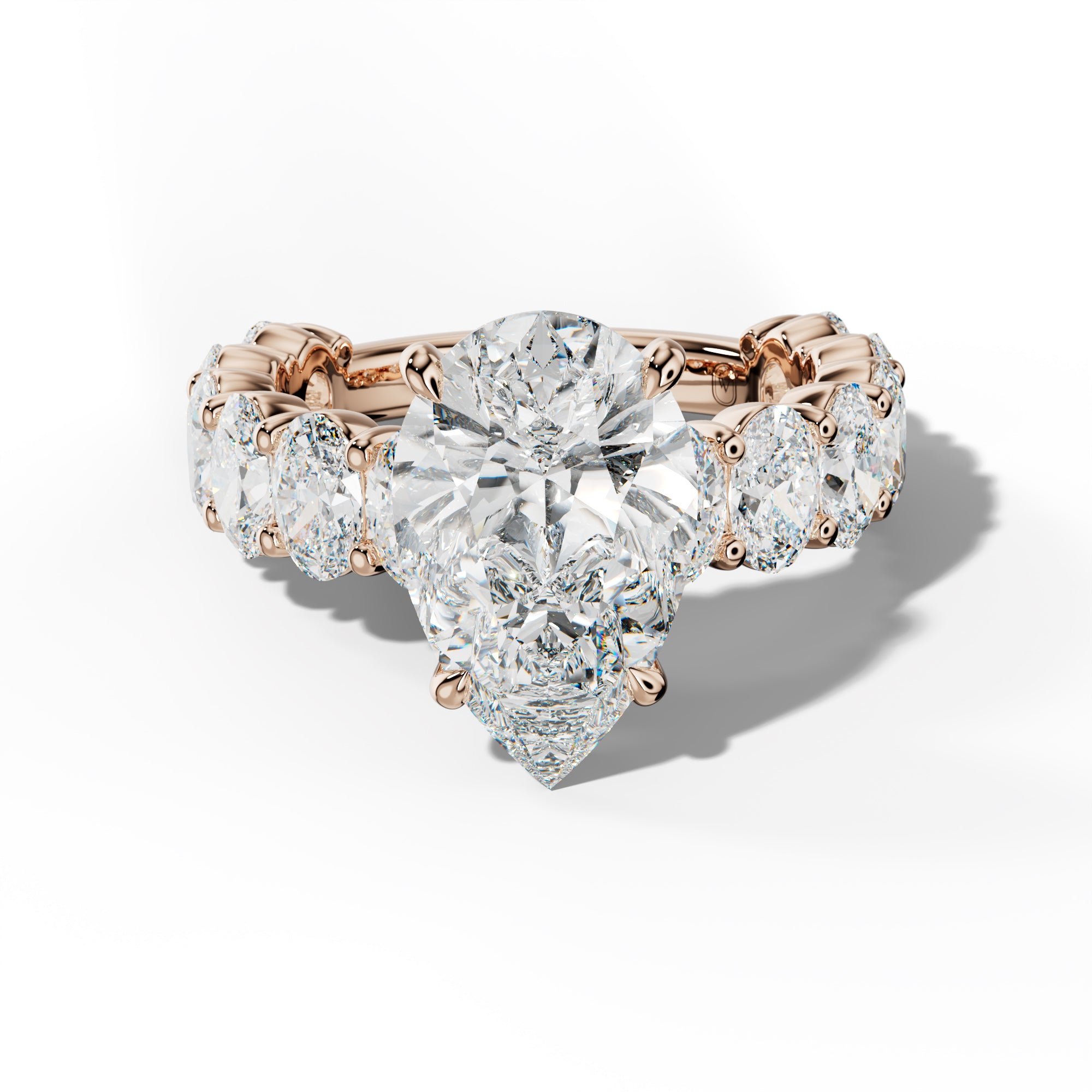 Aaliyah Pear Shape Engagement Ring With Oval Side Stones