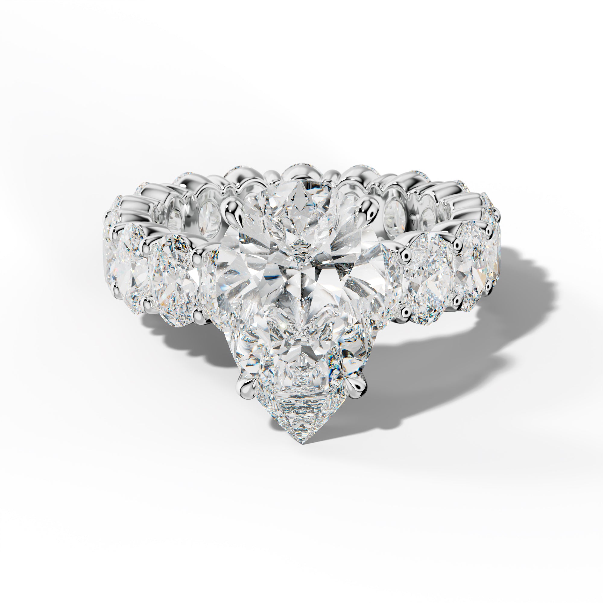 Belen Pear Shape Engagement Ring With Oval Side Stones