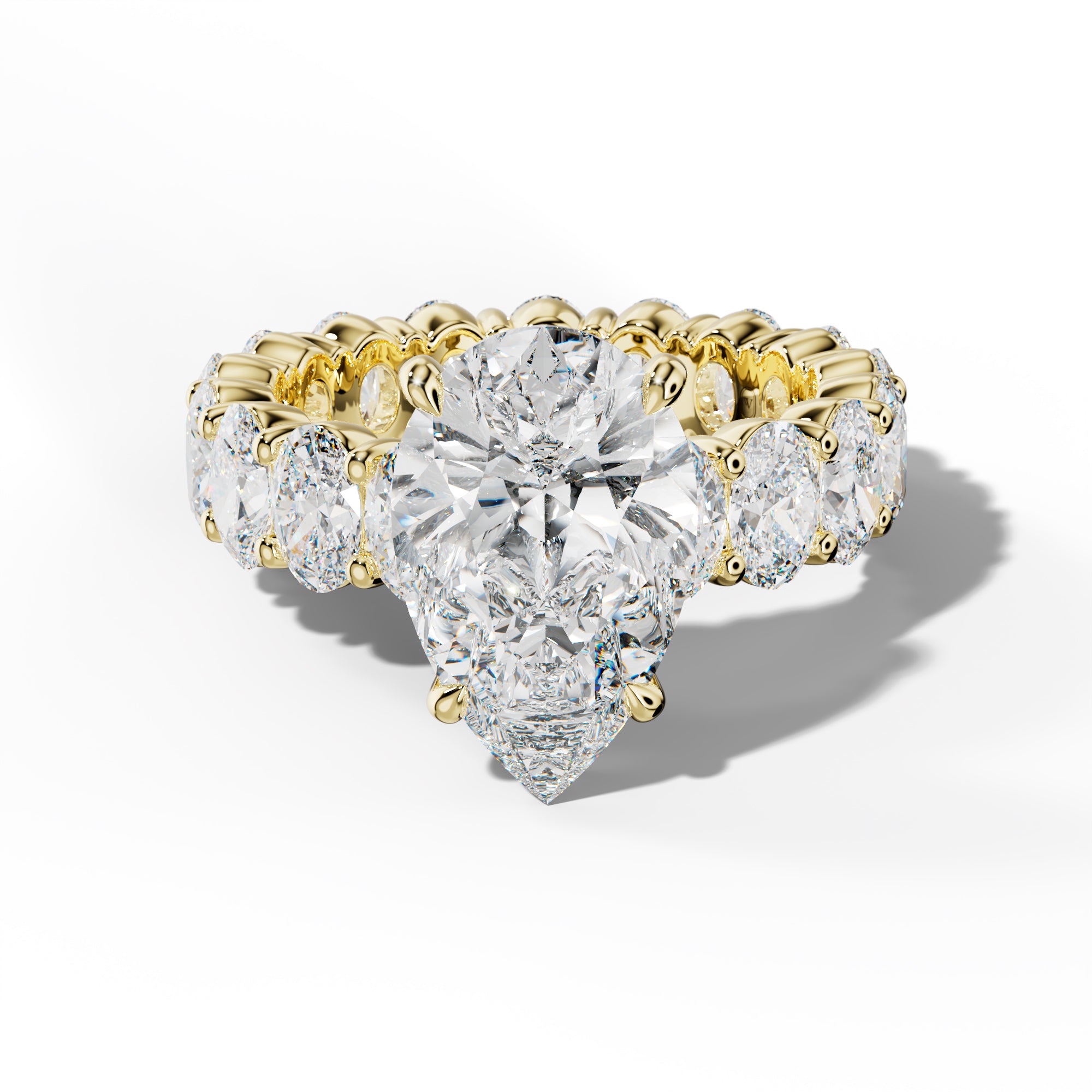 Belen Pear Shape Engagement Ring With Oval Side Stones