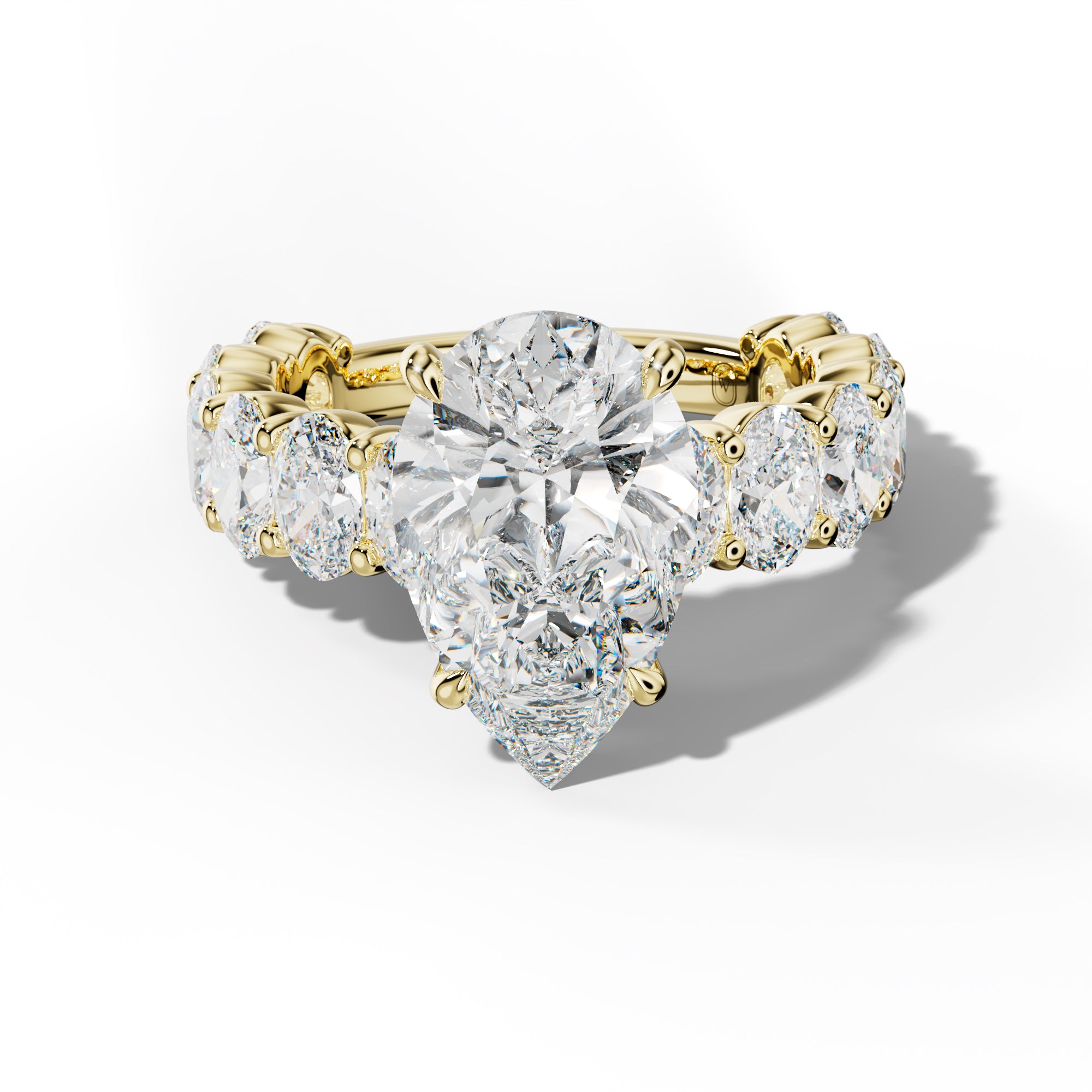 Aaliyah Pear Shape Engagement Ring With Oval Side Stones