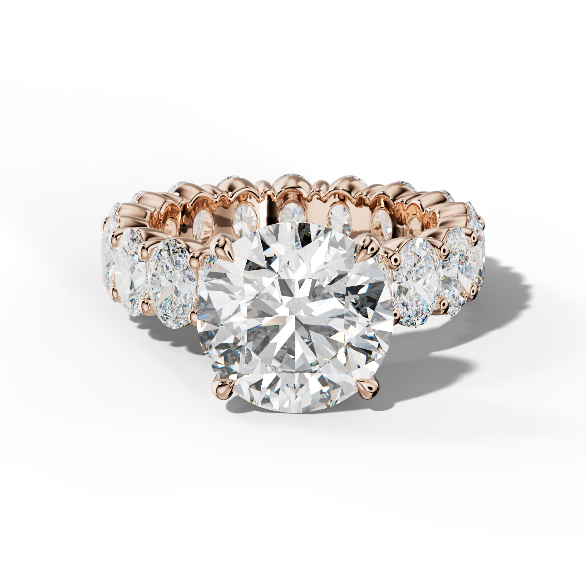 Belen Round Diamond Engagement Ring With Oval Side Stones