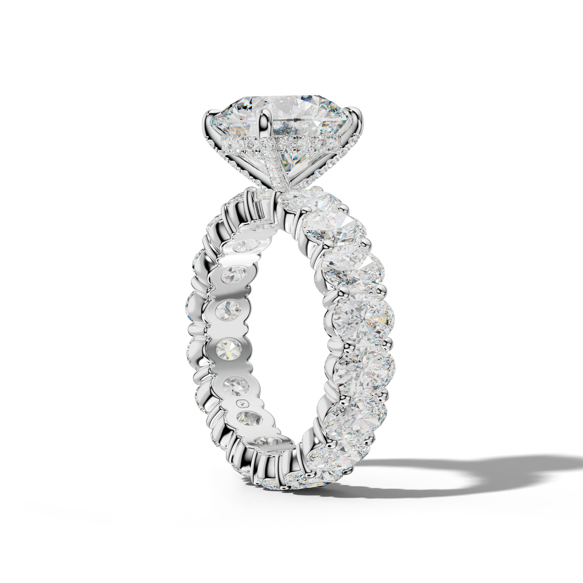 Belen Round Diamond Engagement Ring With Oval Side Stones
