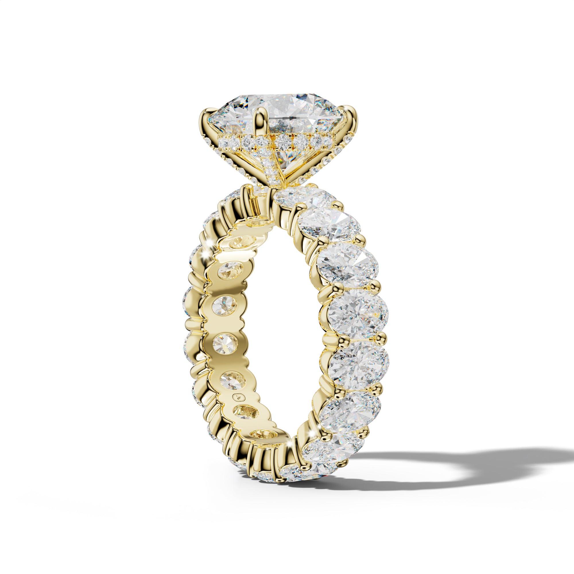 Belen Round Diamond Engagement Ring With Oval Side Stones