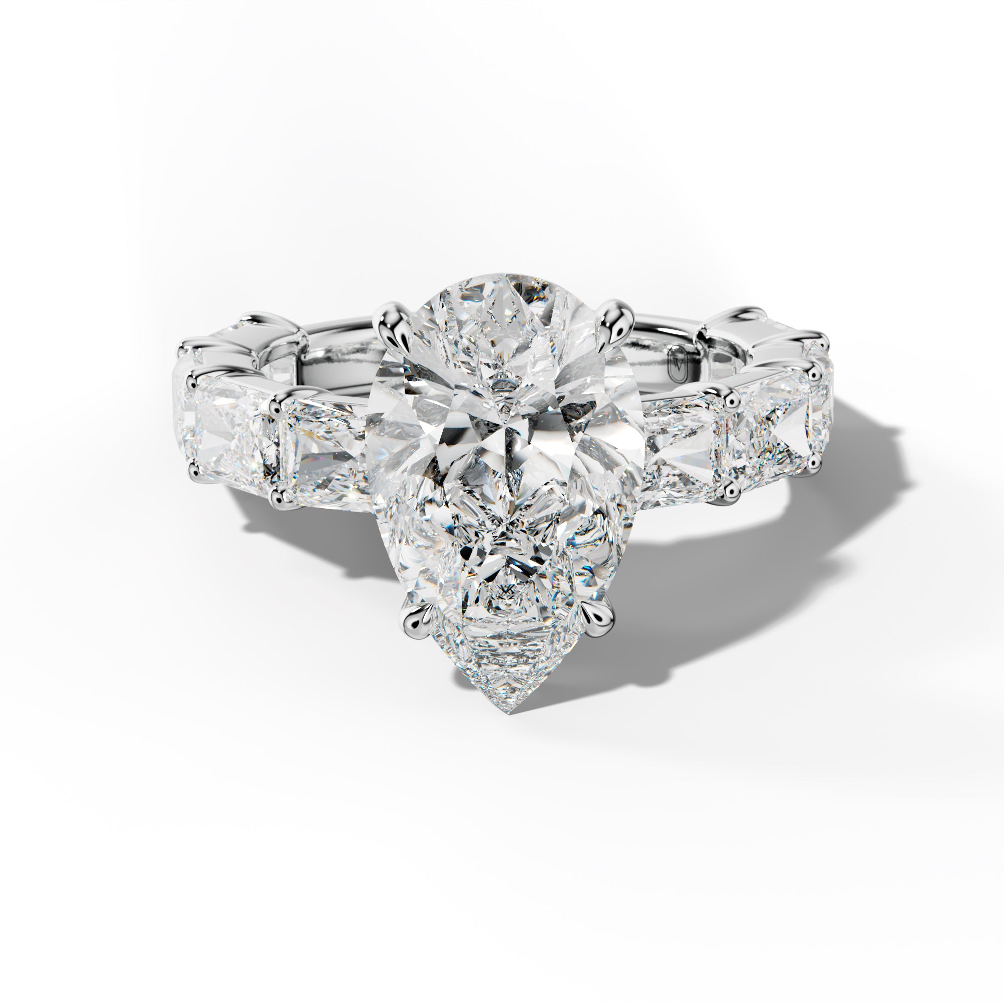 Della Pear Shape Engagement Ring With East West Radiant Side Stones