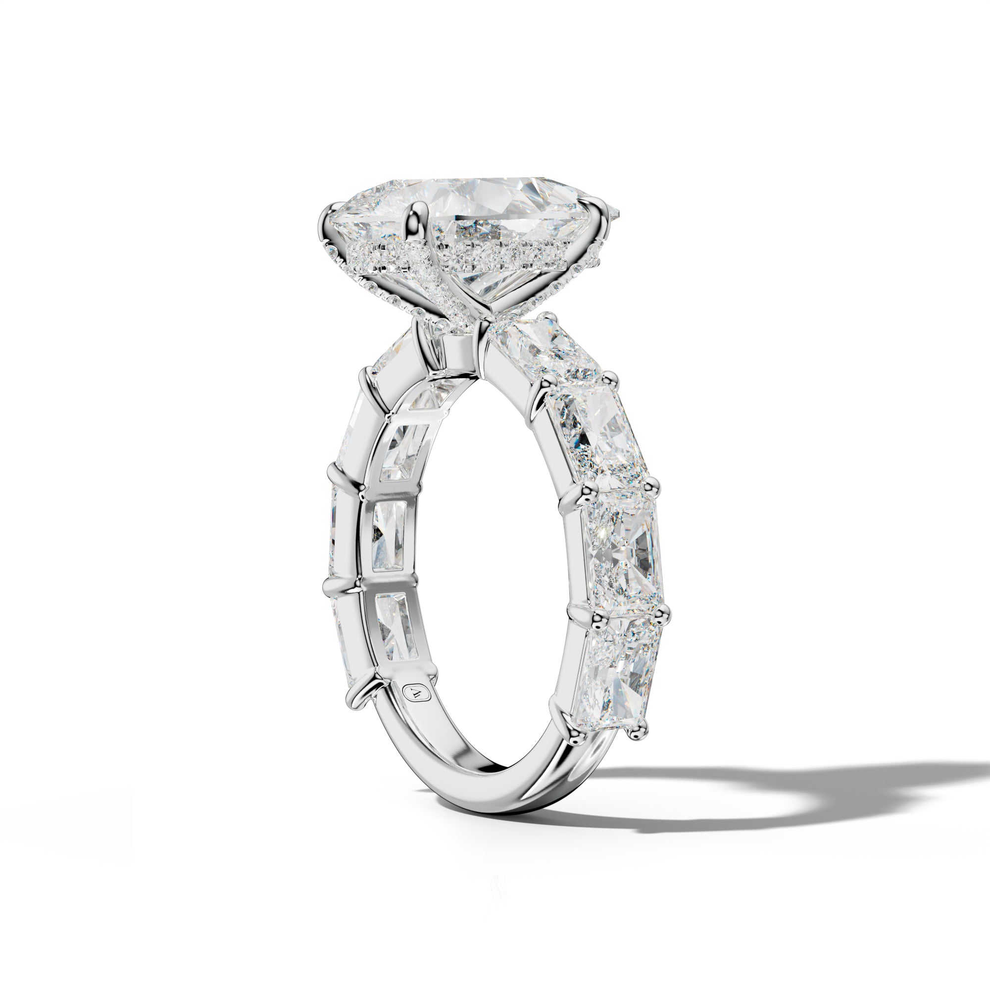 Della Pear Shape Engagement Ring With East West Radiant Side Stones