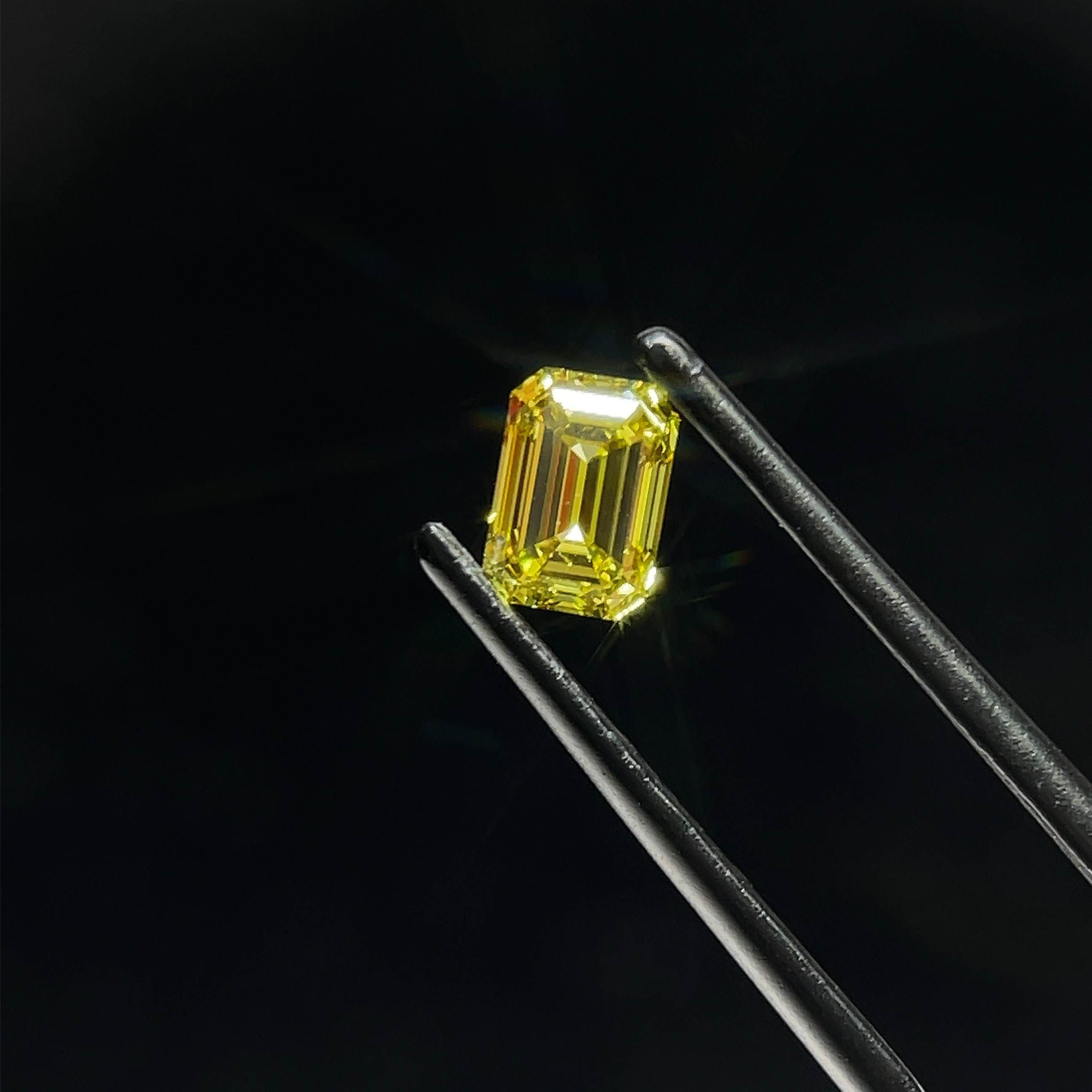 0.74 Carat Emerald Cut Fancy Yellow