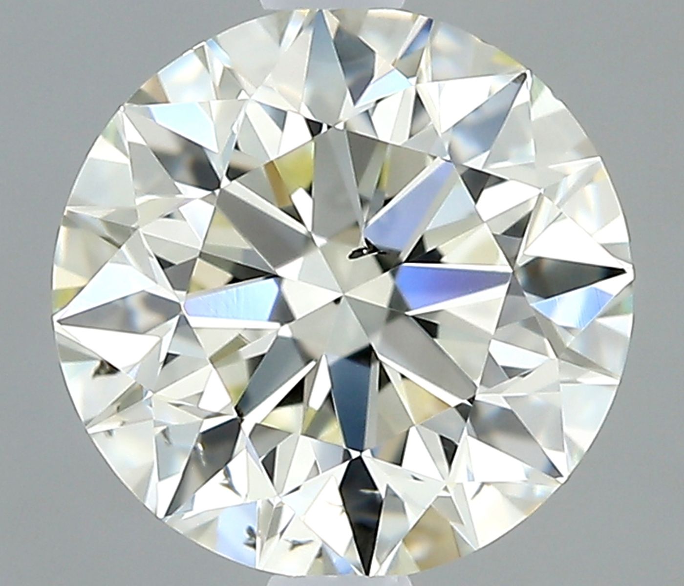 0.90 Carat J-SI1 Round Cut Diamond