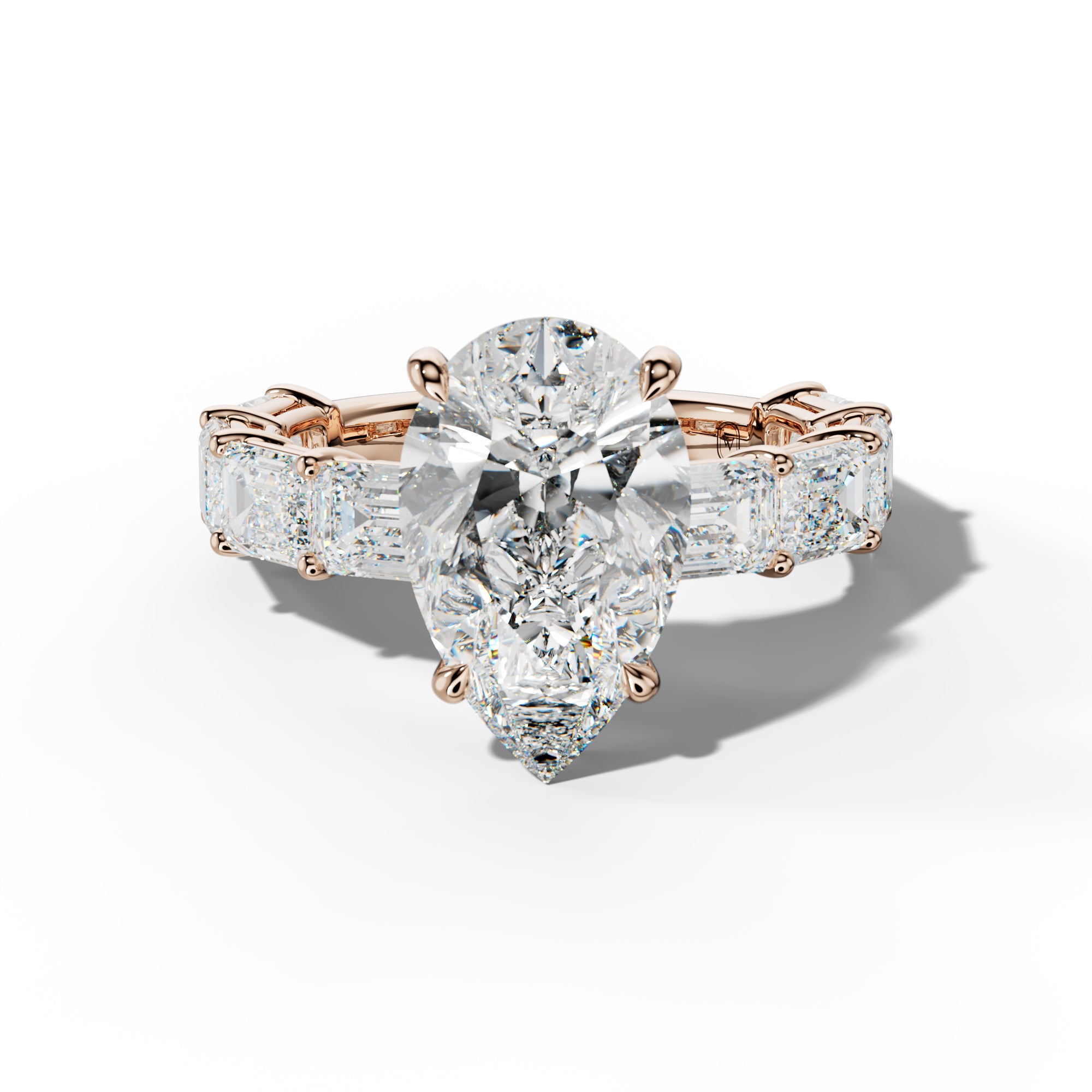 Hayden Pear Shape Engagement Ring With East West Emerald Cut Side Stones