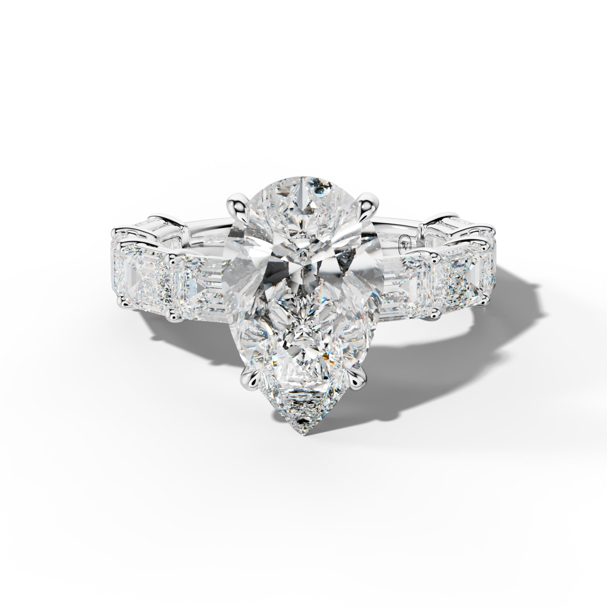 Hayden Pear Shape Engagement Ring With East West Emerald Cut Side Stones