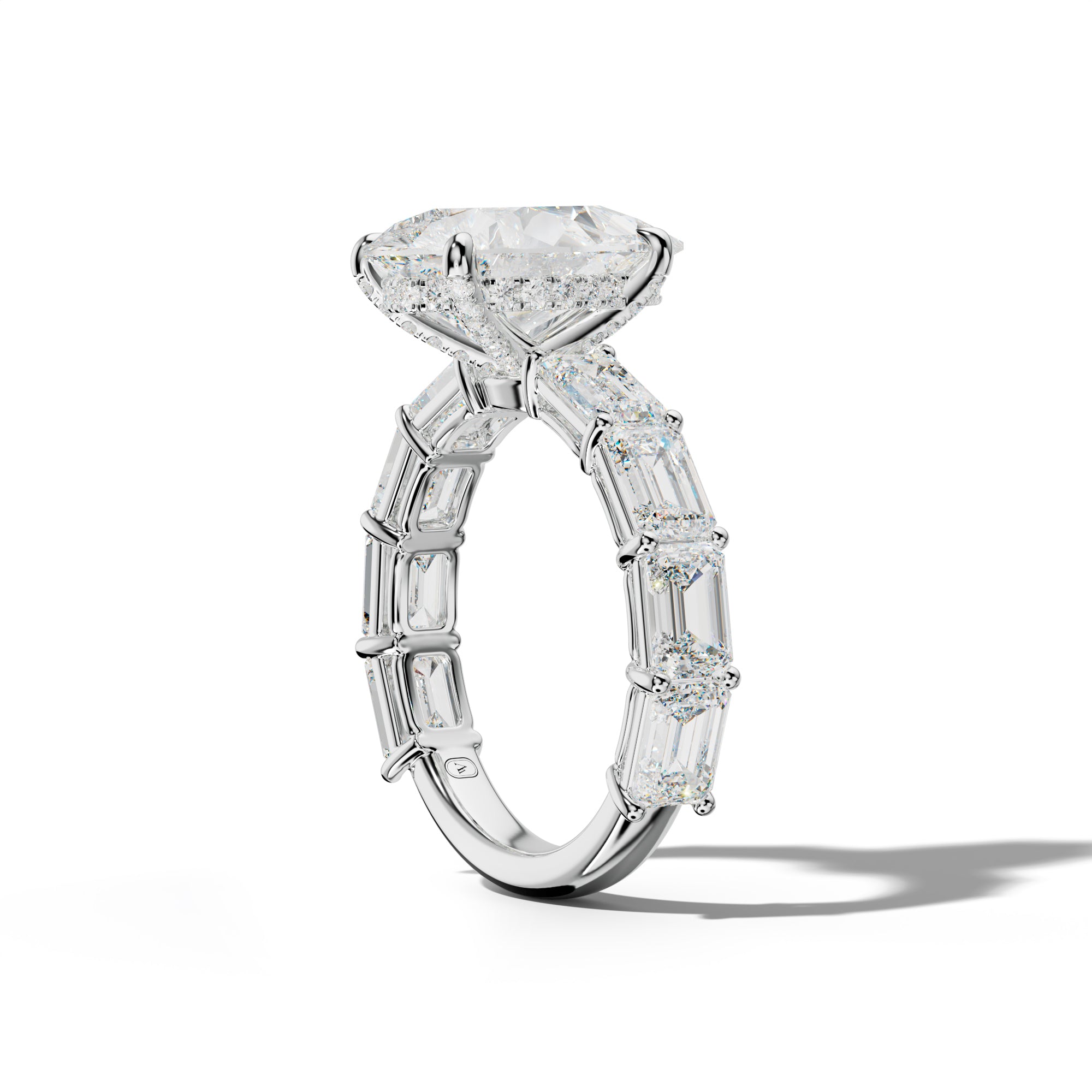 Hayden Pear Shape Engagement Ring With East West Emerald Cut Side Stones