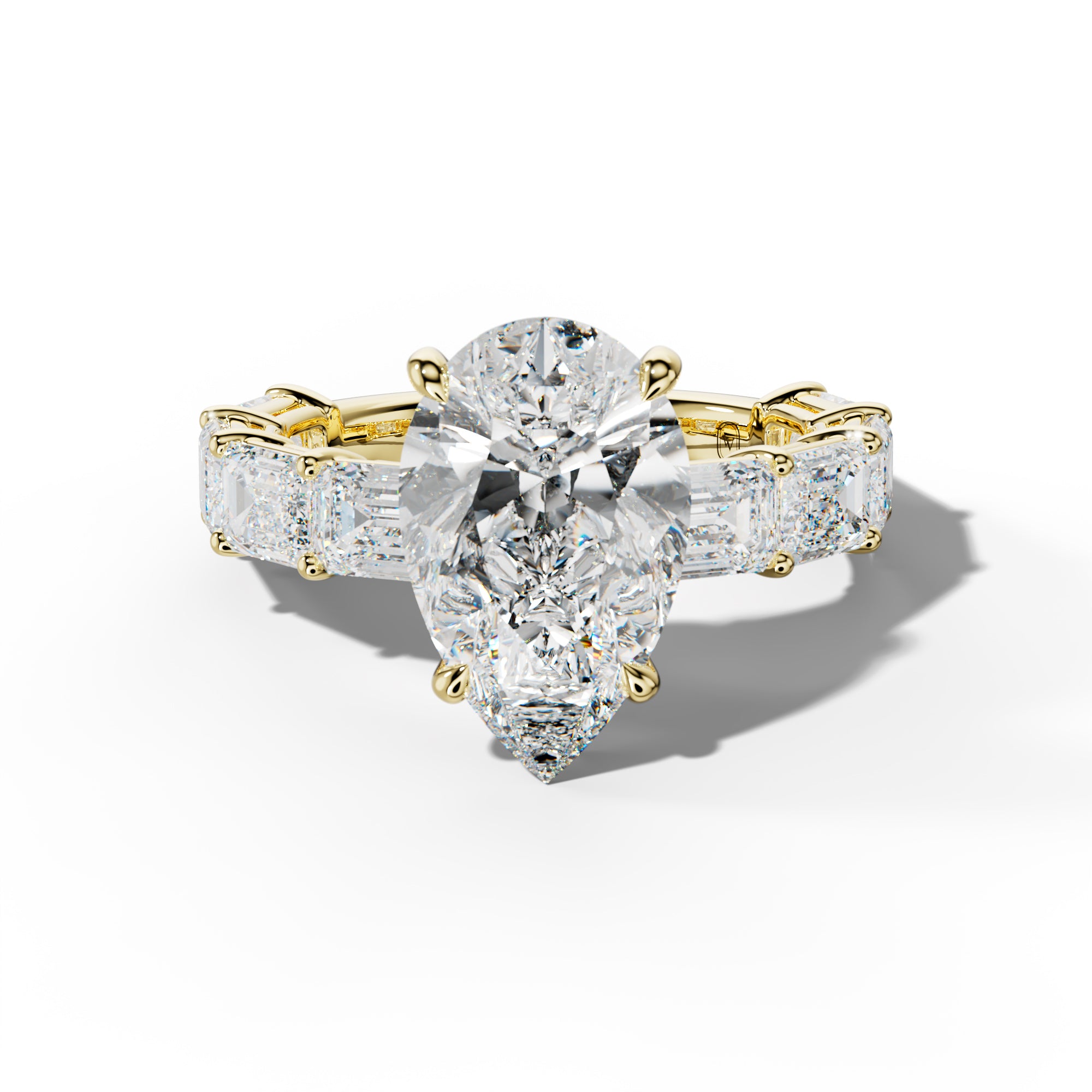 Hayden Pear Shape Engagement Ring With East West Emerald Cut Side Stones